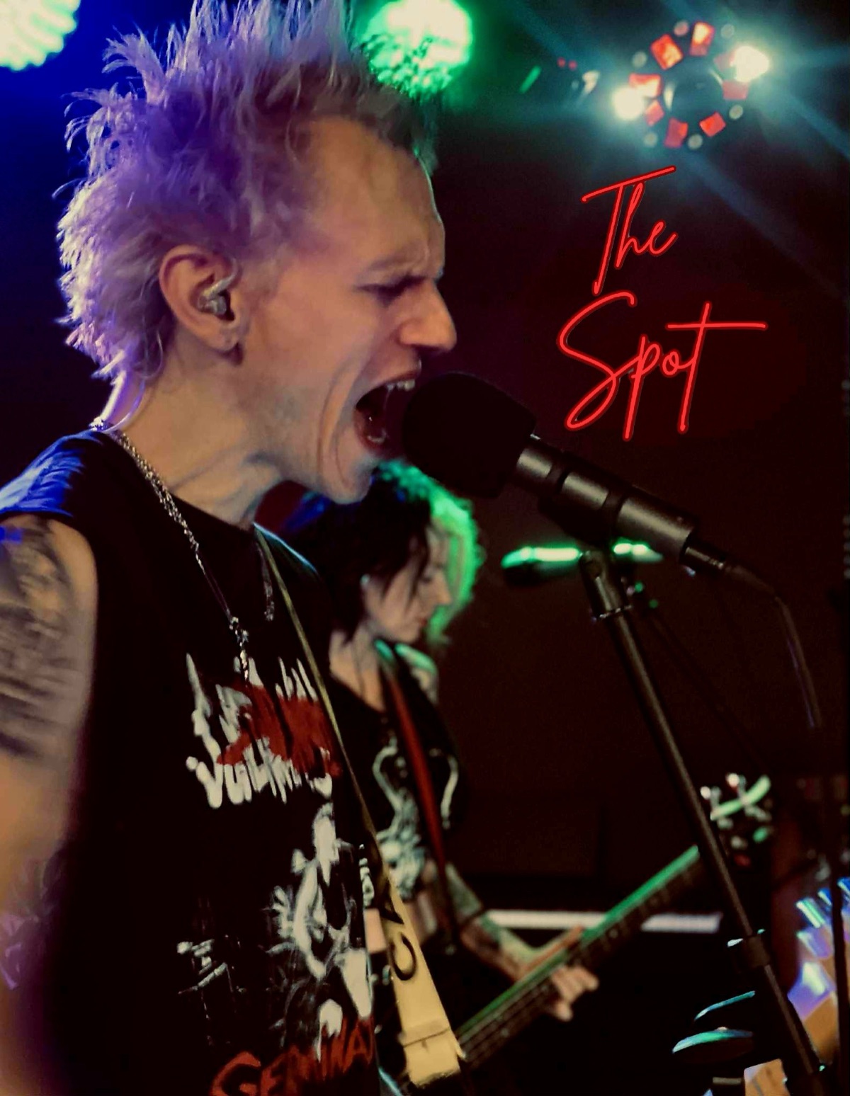 Performer on stage at The Spot Nashua